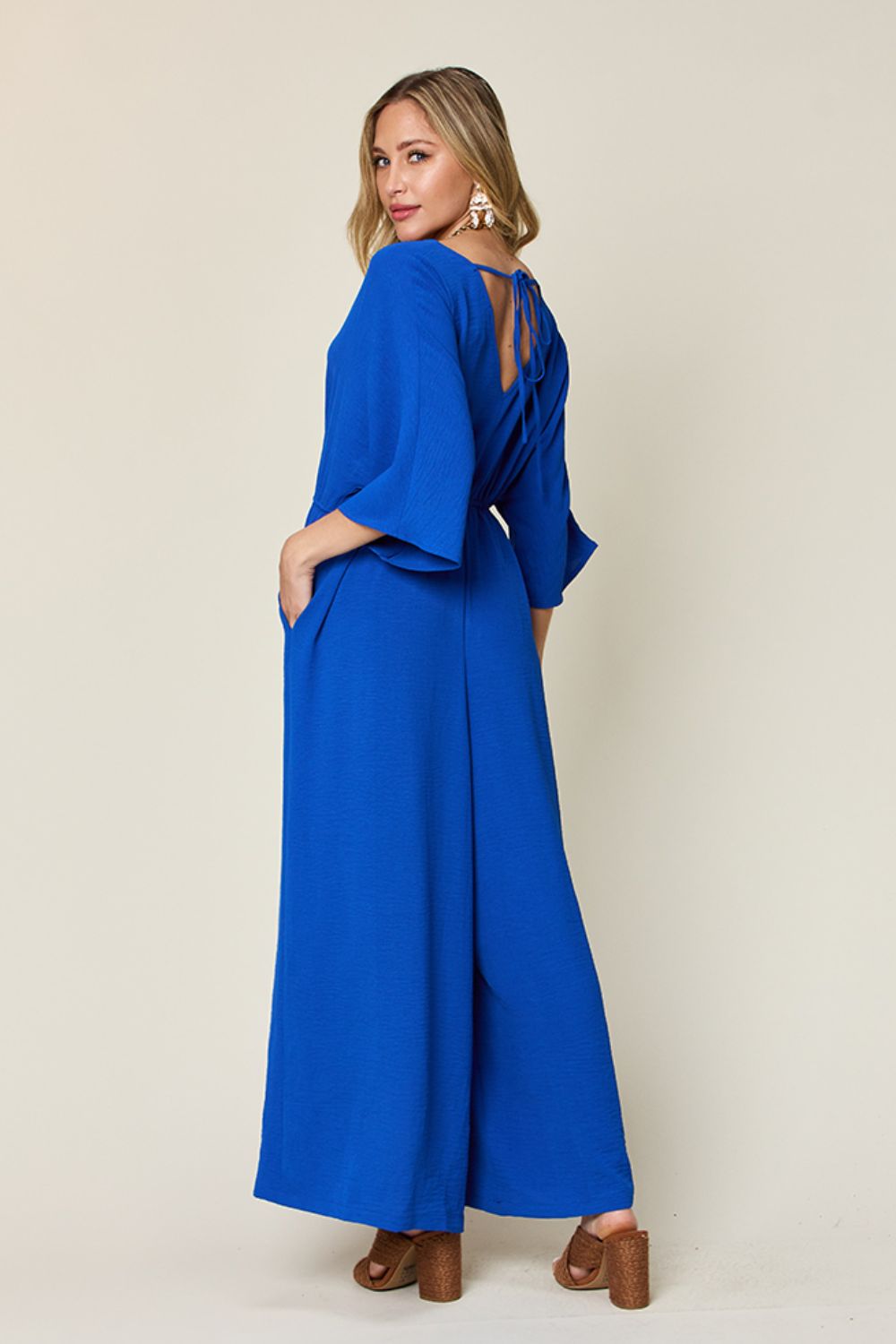 Double Take Full Size Surplice Wide Leg Jumpsuit with Pockets - Luxe4Everyday Jumpsuit